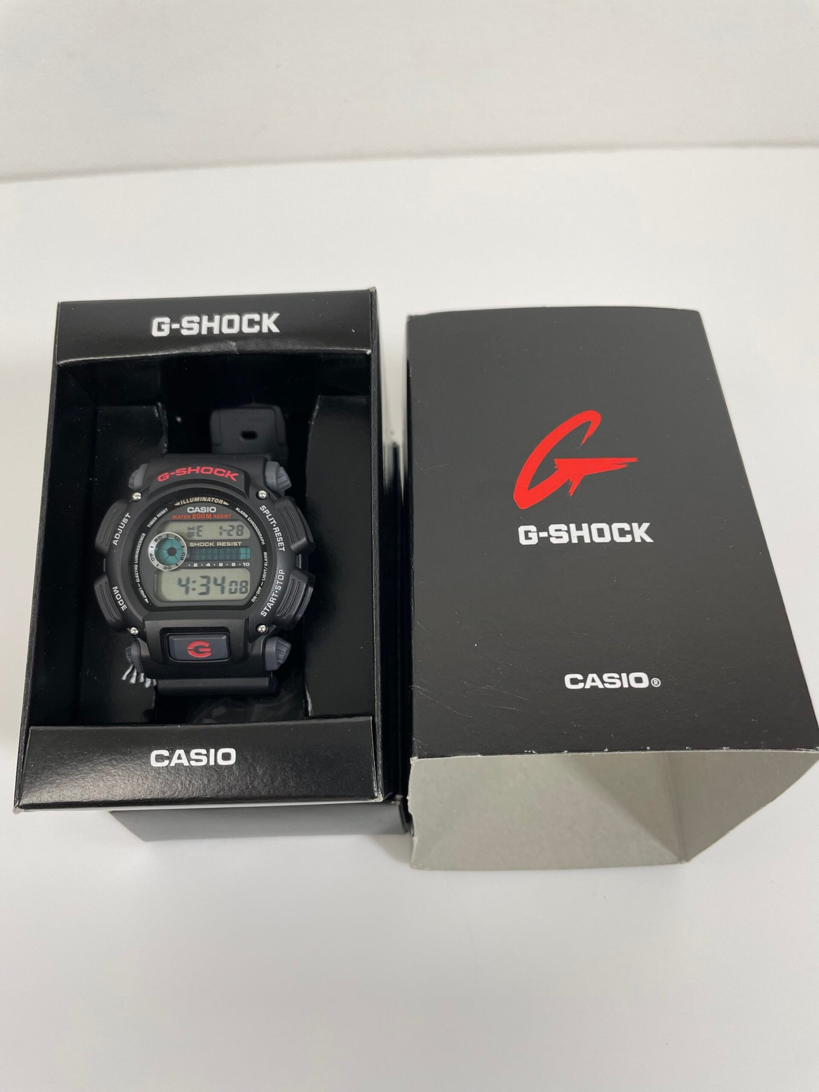 Relogio Casio DW9052 Series | Men’s Digital Watch | G-Shock | 1/100 SEC Stop Watch | Countdown Timer | LED Light | 200M WR | Shock Resistant | Multi Alarm | Auto Calendar | Dual Time | 2 Yr Batt - Imagem 2