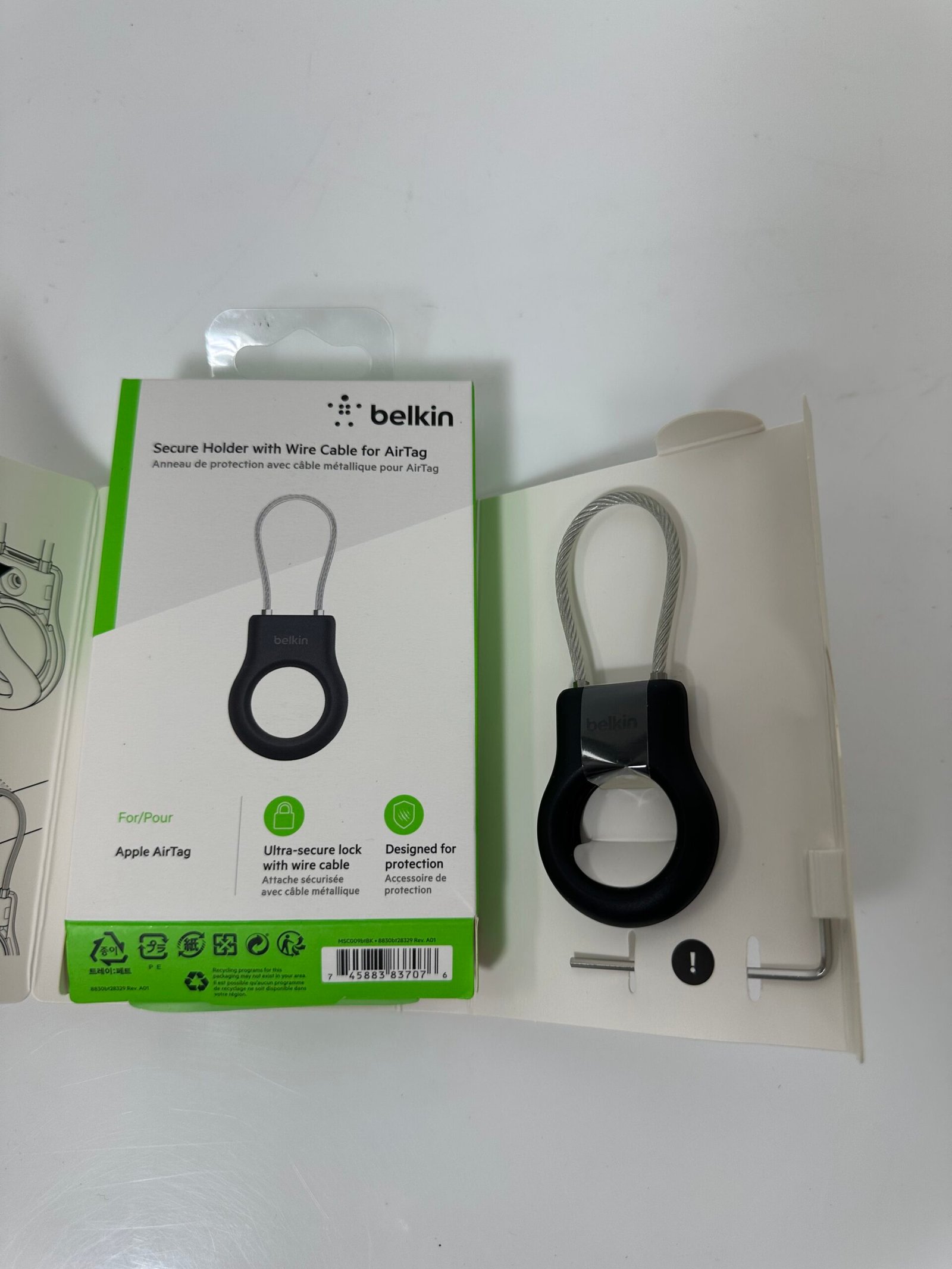 Belkin - Secure Holder for AirTag with wired cable l Proteção para AirTag com cabo traçado - Produto Novo (Open Box)